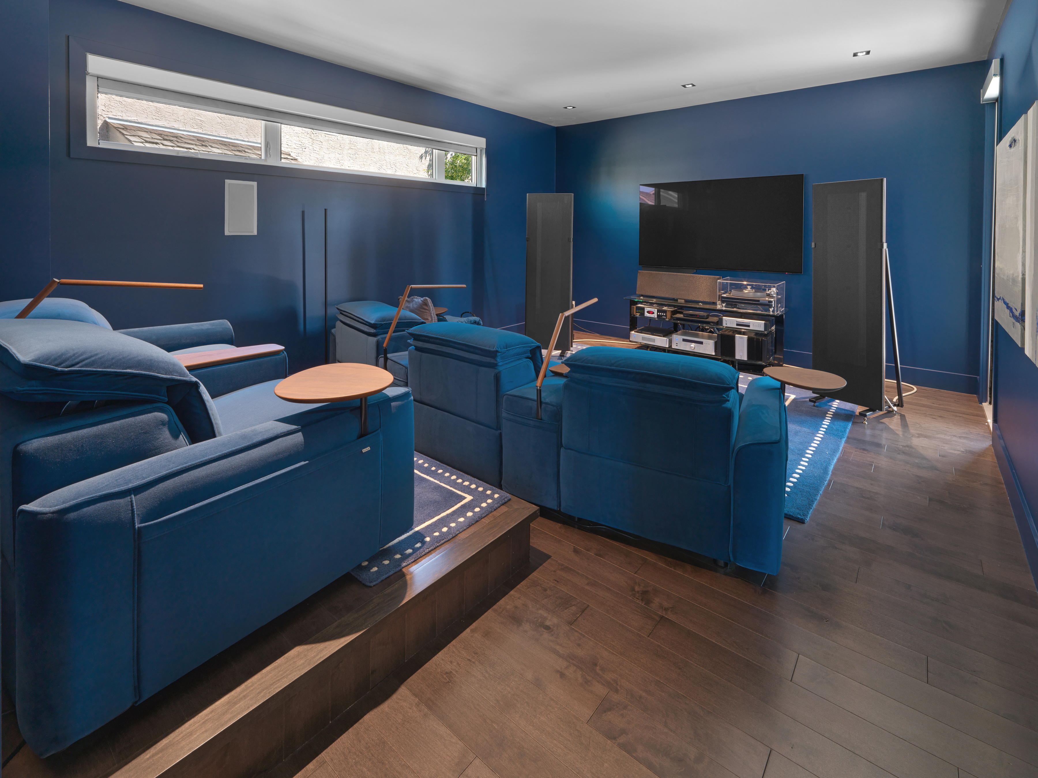Home theatre in 703 Dalhousie Way in Donsdale home for sale by Holland and Associates Real Estate in Edmonton.
